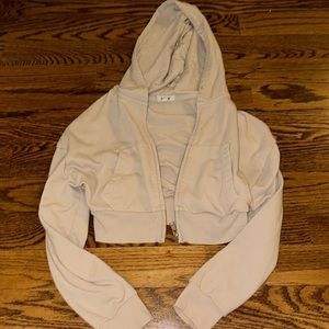 beige garage cropped zip up hoodie